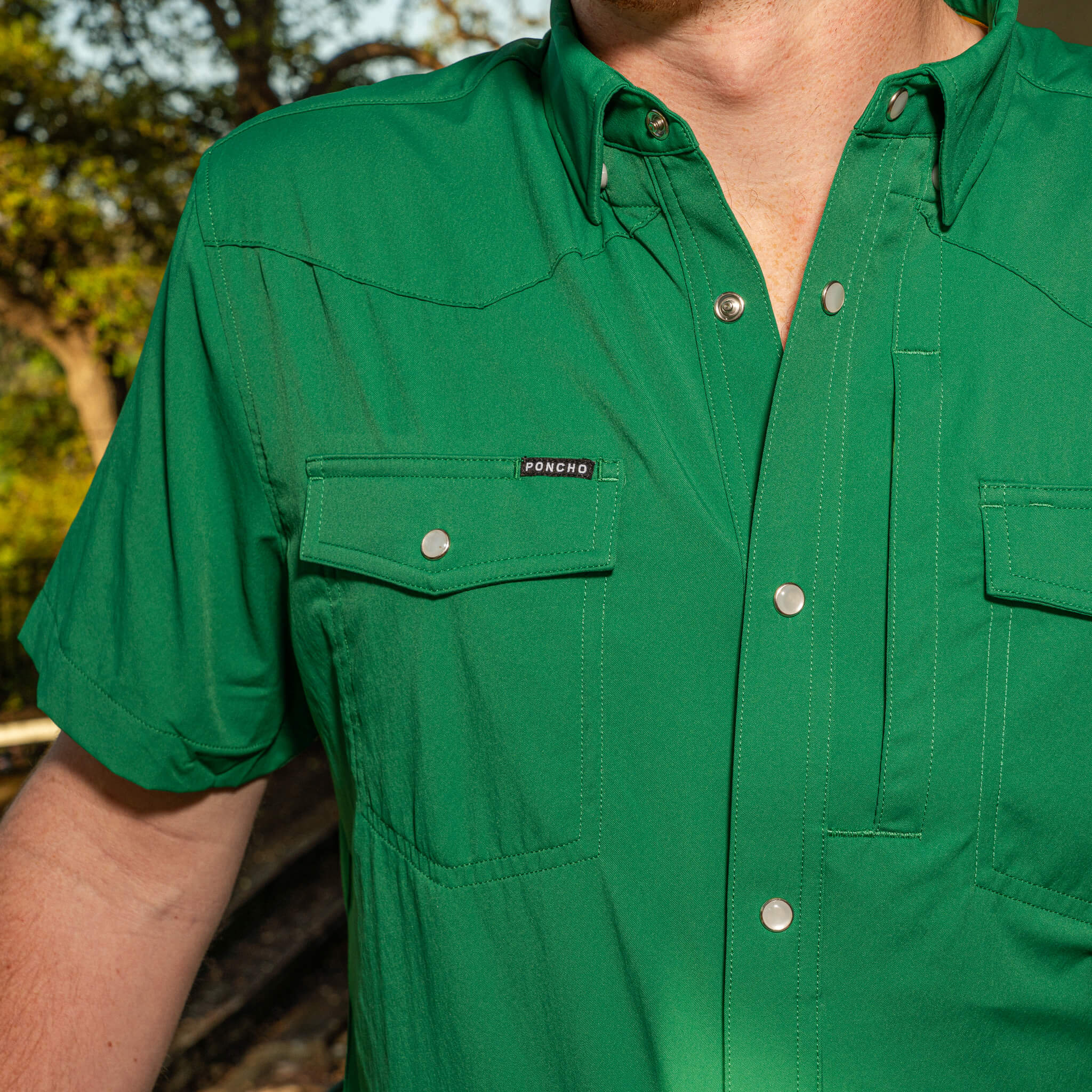 closeup of green western short sleeve shirt