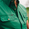 closeup of green shirt chest pockets