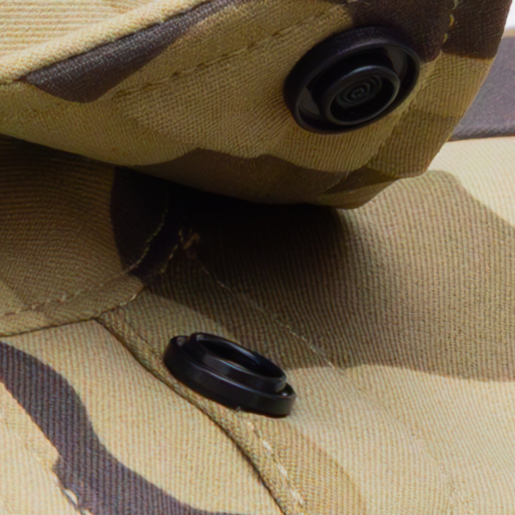 close up of snap collar on camo button up