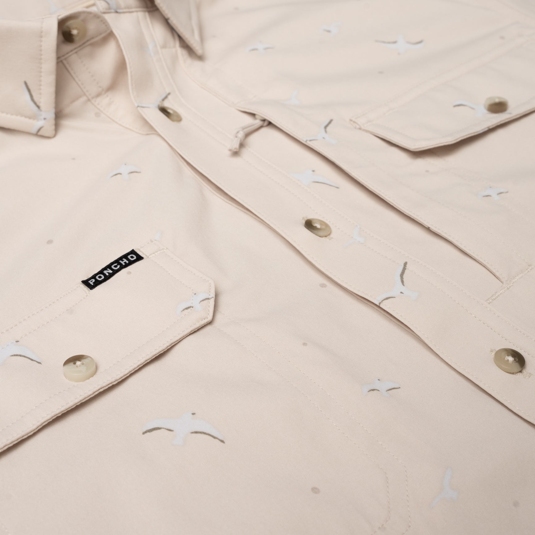 close up photo of seagull print shirt with chest pockets 