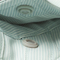 hidden button collar on green micro grid fishing shirt