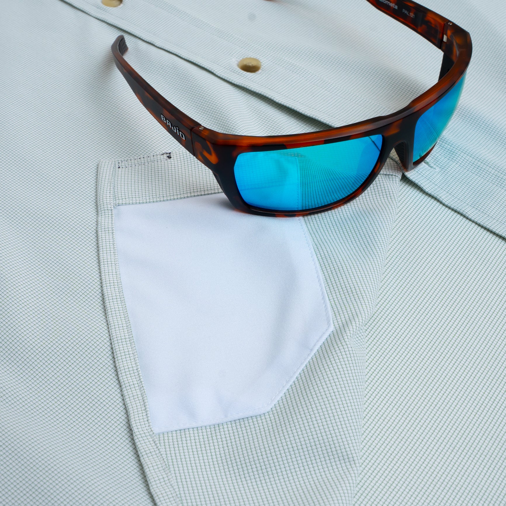 sunglasses sitting on hidden sunglass cleaner pocket