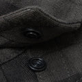 close up of hidden collar snap buttons on pearl snap