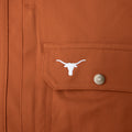 close up of texas longhorn logo on chest pocket