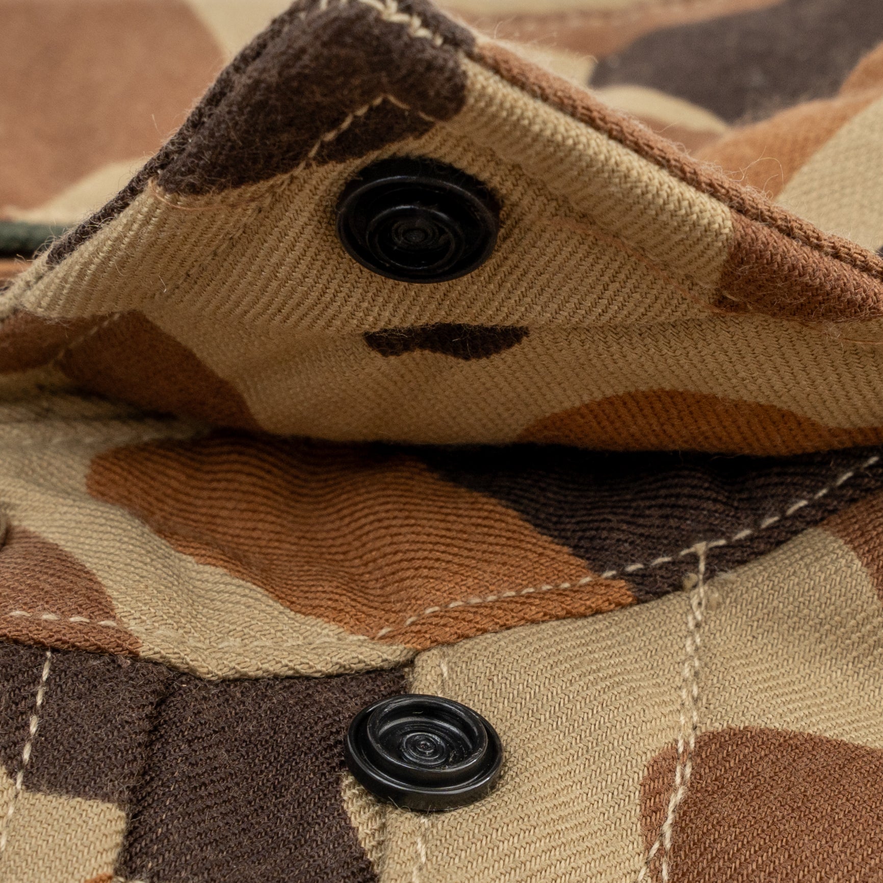 Hidden button snap collar on camo pearl snap flannel