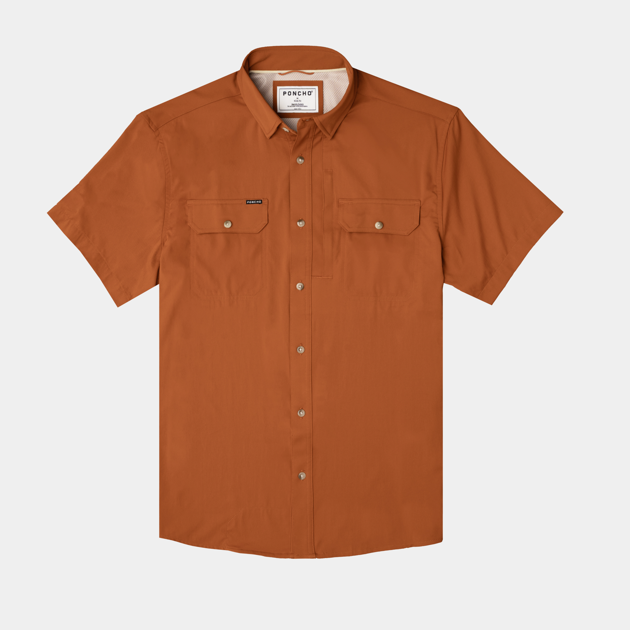 flat lay photo of burnt orange shirt