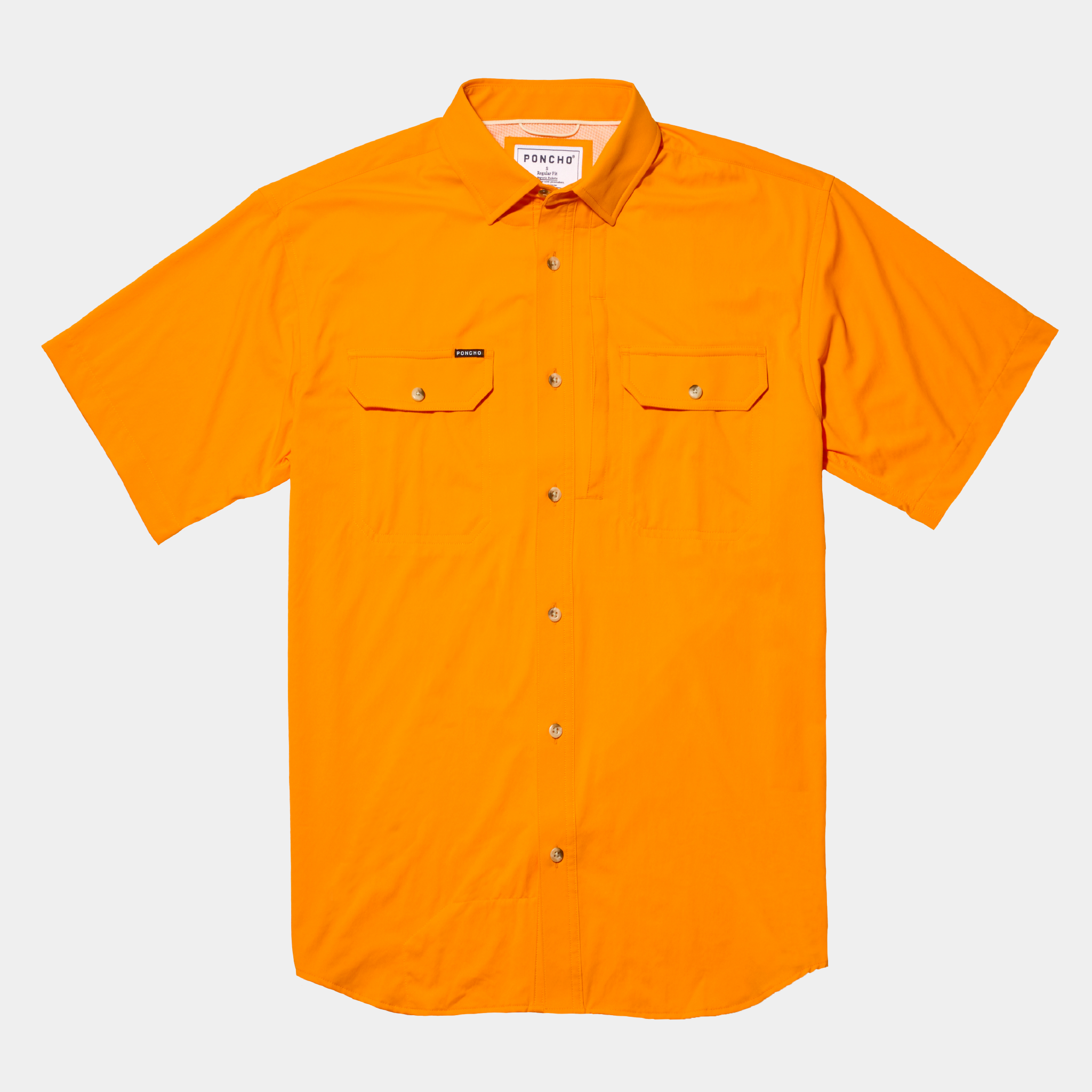 Flat lay photo of bright orange button up shirt