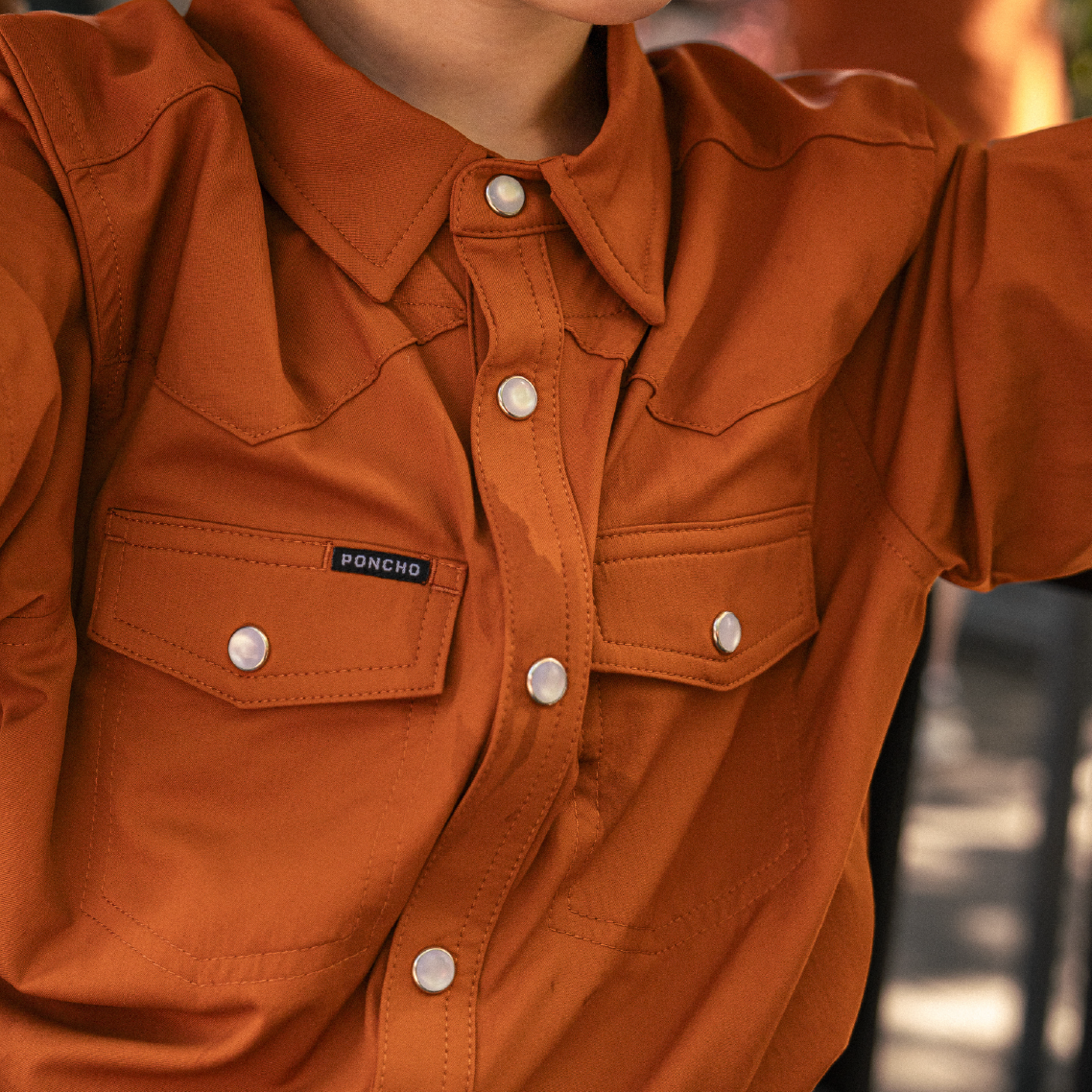 close up of pockets on pearl snap western long sleeve shirt