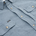 Close up photo of blue flannel with chest pocket