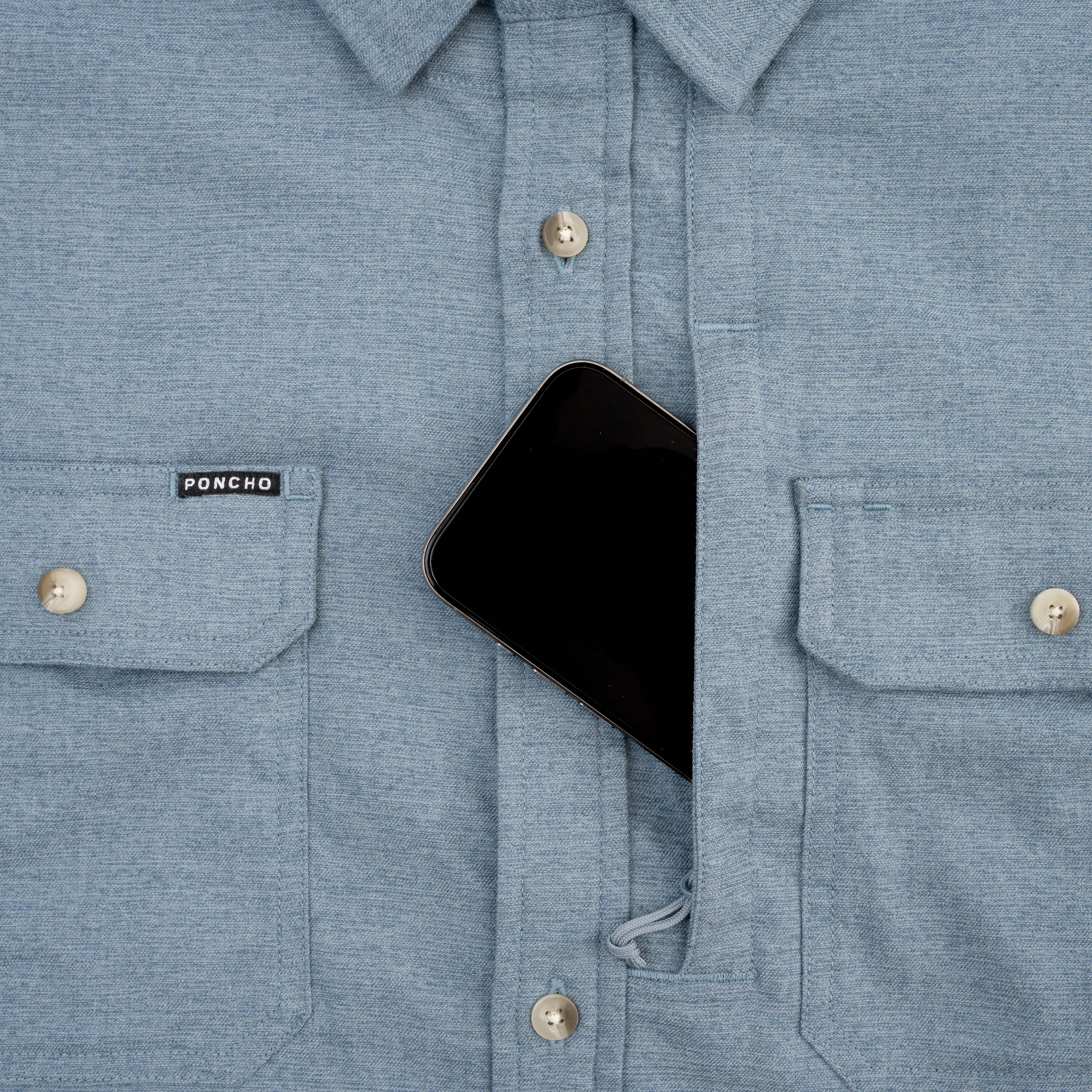 Phone in chest pocket of blue flannel 